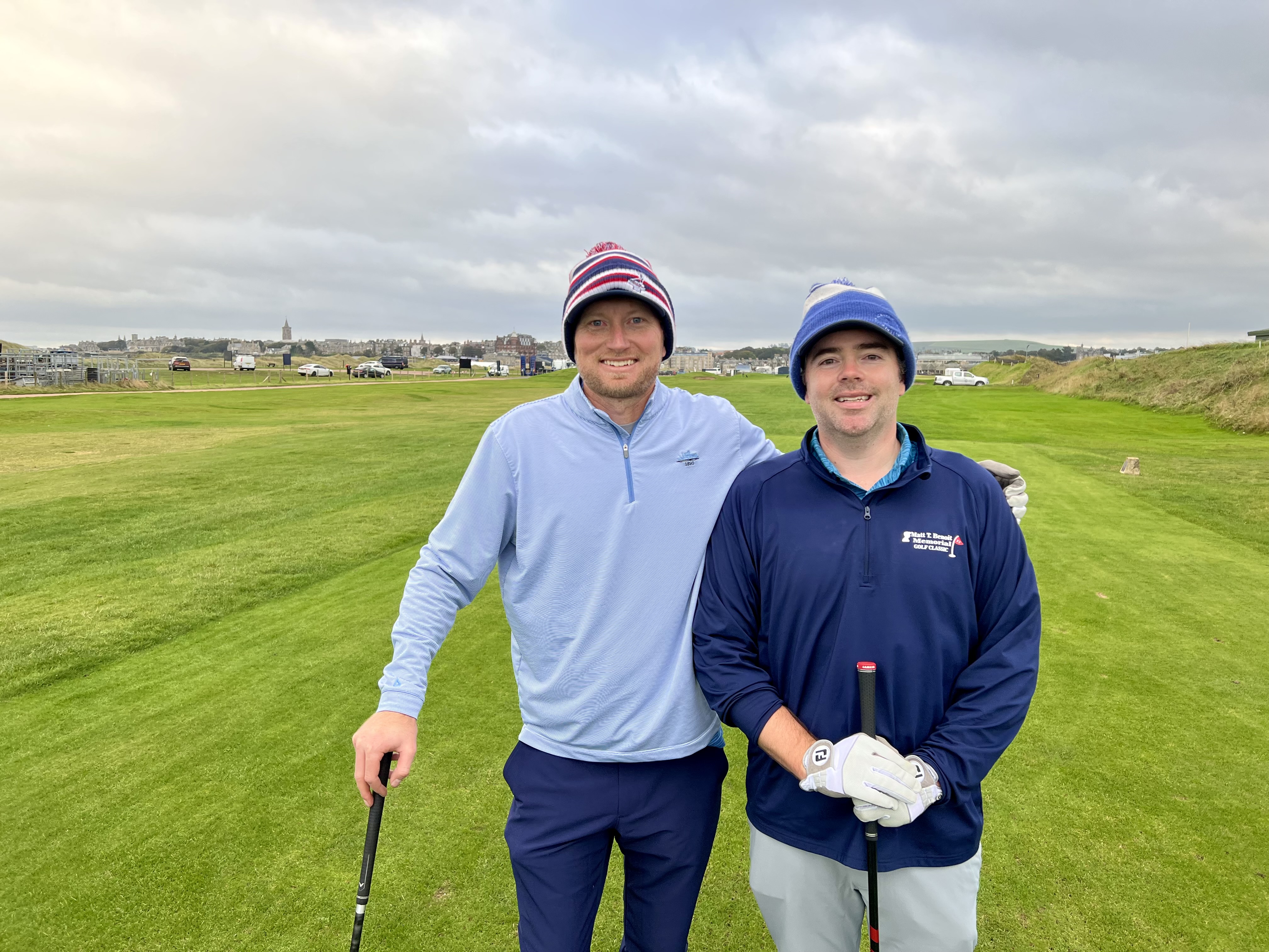 Photo of Kevin and JJ on the golf course