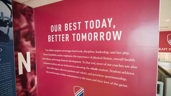 A photo of a wall mural reading Our Best Today, Better Tomorrow
