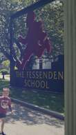 A sign with the Fessenden logo