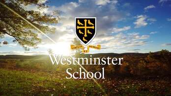 Westminster School logo in front of a field